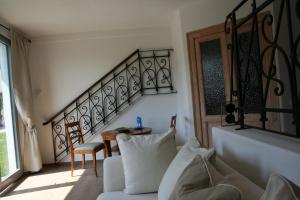 A seating area at La Baita Dinner & Bed