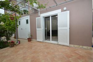 Fotografia z galérie ubytovania Apartment with garden - Ana 1 v Mali Lošinj