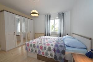 Posteľ alebo postele v izbe v ubytovaní Apartment with garden - Ana 1