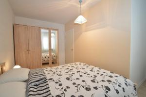 Posteľ alebo postele v izbe v ubytovaní Apartment with garden - Ana 1