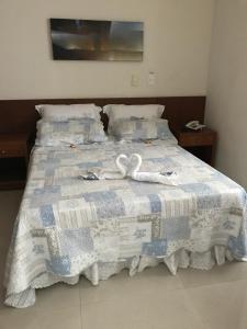 Postel nebo postele na pokoji v ubytování Flat Na Praia da Costa + 24 fotografií