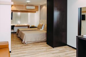 Cama ou camas em um quarto em Hotel Executive Arrey mais 37 fotos