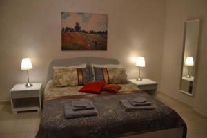 Postel nebo postele na pokoji v ubytování Residenze Principe Amedeo