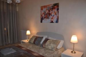 Postel nebo postele na pokoji v ubytování Residenze Principe Amedeo