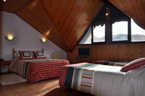 Cama o camas de una habitación en Hotel Tirol