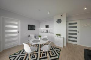 Kuchyňa alebo kuchynka v ubytovaní Apartament Horyzont Amber