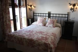 Tempat tidur dalam kamar di Hacienda Olontigi
