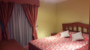 Cama o camas de una habitación en Casa en La Serena
