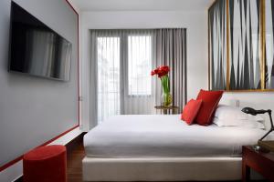 Postel nebo postele na pokoji v ubytování Hotel Pulitzer
