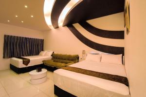 Postel nebo postele na pokoji v ubytování Easy Home Stay