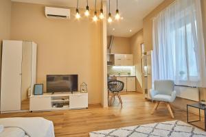Kuchyňa alebo kuchynka v ubytovaní A26 Apartment