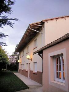 a building with lights on the side of it at Le Relax in Montaigu-Vendée