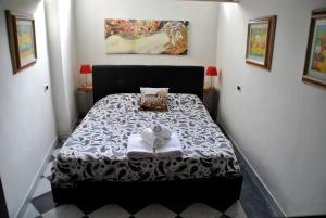 フィレンツェにあるSuite Prestoの小さなベッドルーム(ベッド1台付)
