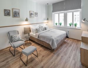 Posteľ alebo postele v izbe v ubytovaní Mordecai 12 Apartments by Adrez