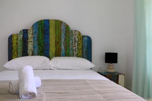 מיטה או מיטות בחדר ב-Grand Bleu Apartments & Villas