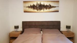 A bed or beds in a room at Ferienwohnung Kohlhofen
