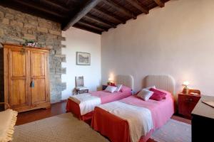 Posteľ alebo postele v izbe v ubytovaní Torre Donati