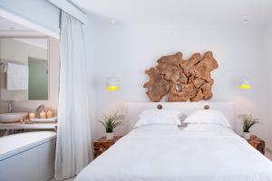 Postel nebo postele na pokoji v ubytování Myconian Villa Collection - Preferred Hotels & Resorts
