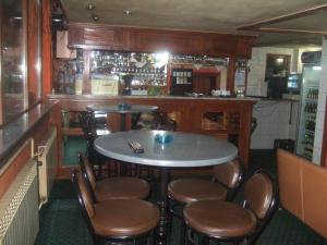Salone o bar di Rooms Zebax