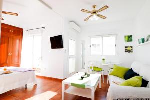 A television and/or entertainment centre at Summerland Apartments Rota
