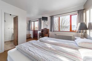 Letto o letti in una camera di Eric the Red Guesthouse