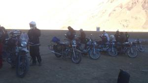 a group of motorcycles parked in front of a mountain at Himalayan Routes Camp Sarchu in Sir Bhum Chun
