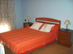 A bed or beds in a room at Vistas al mar y cerca de la playa