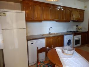 A kitchen or kitchenette at Vistas al mar y cerca de la playa