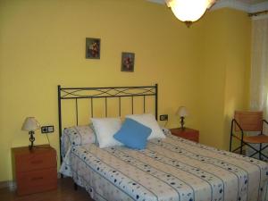 A bed or beds in a room at Vistas al mar y cerca de la playa