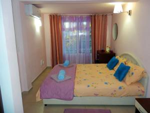 Postel nebo postele na pokoji v ubytování Apartments Vladilena