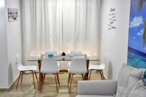 Posedenie v ubytovaní WonderStays Apartamentos Vela