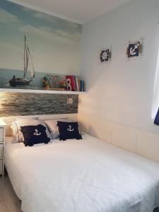 Postel nebo postele na pokoji v ubytování Amko Style Apartamenty Przystań 26 Willa Nord