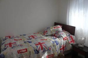 Cama o camas de una habitación en Amplia y Acogedora Casa en Puerto Montt