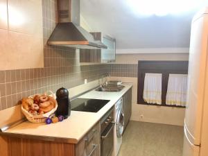 A kitchen or kitchenette at Apartamentos Rurales Flor De Lavanda