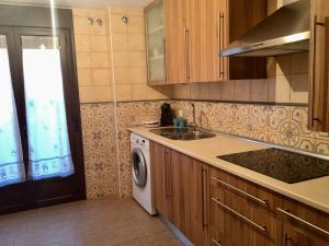 A kitchen or kitchenette at Apartamentos Rurales Flor De Lavanda