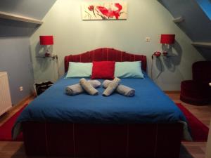 Cama o camas de una habitación en La Demeure
