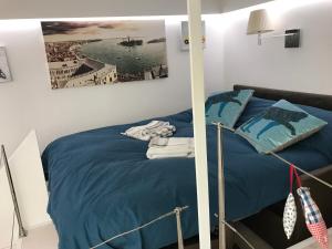 Un pat sau paturi într-o cameră la Venicedire