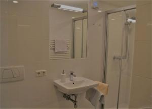 Ein Badezimmer in der Unterkunft Appartements Ferienwohnungen Alpenblick