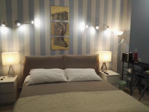Postel nebo postele na pokoji v ubytování B&B Pescara Centro Luxury Suite