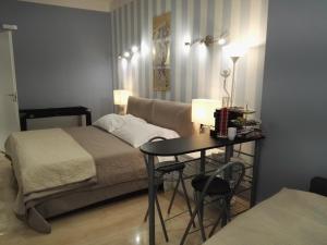 Postel nebo postele na pokoji v ubytování B&B Pescara Centro Luxury Suite
