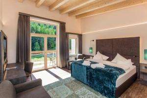 Posezení v ubytování Hotel Vier Jahreszeiten