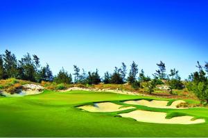 a view of a golf course with a green field at Clean & Quiet Villa - The Point Resort in Danang