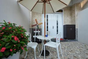 Patio nebo venkovní prostory v ubytování 日晴民宿 Sun Day + 15 fotografií
