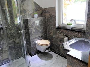 Koupelna v ubytování Travelers Home