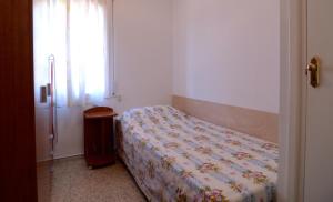 Posteľ alebo postele v izbe v ubytovaní Gregal - apartamentos