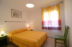 Posteľ alebo postele v izbe v ubytovaní Gregal - apartamentos