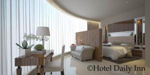 Katil atau katil-katil dalam bilik di Hotel Daily Inn