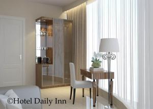 Katil atau katil-katil dalam bilik di Hotel Daily Inn