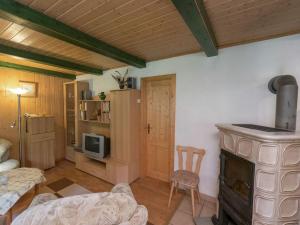 Postel nebo postele na pokoji v ubytování Bungalow in Neustadt nahe Barbarossa Höhle + 28 fotografií