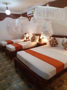 Letto o letti in una camera di Sigiri Heritage Villa